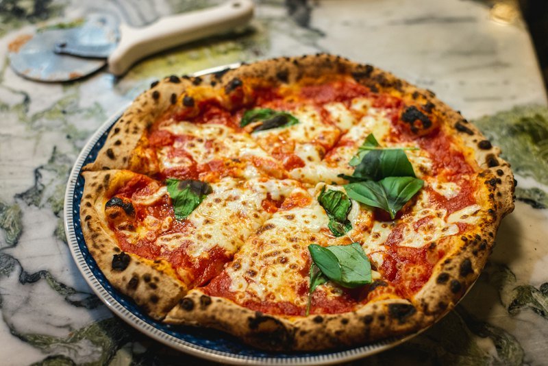 Margherita pizza with basil